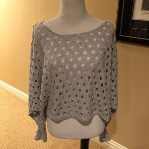 Cute grey sweater w/holes throughout slouched arms